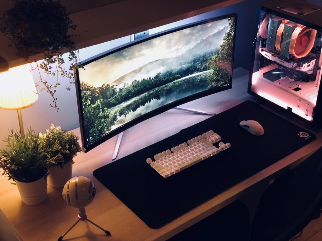 An example of a gaming desk setup with an extra large mousepad.