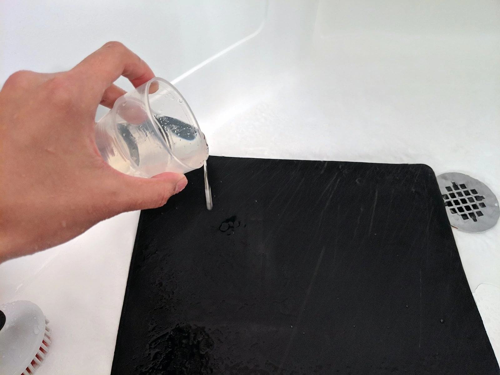 Use laundry detergent to clean off oils and debris