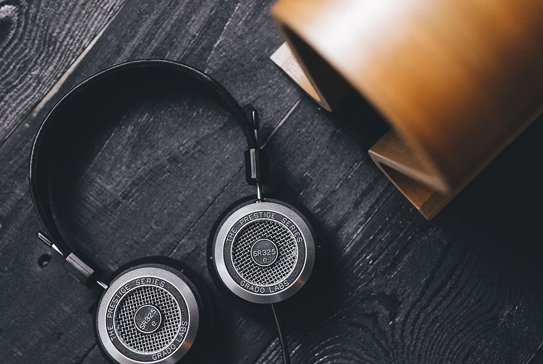 headphone and wooden omega stand