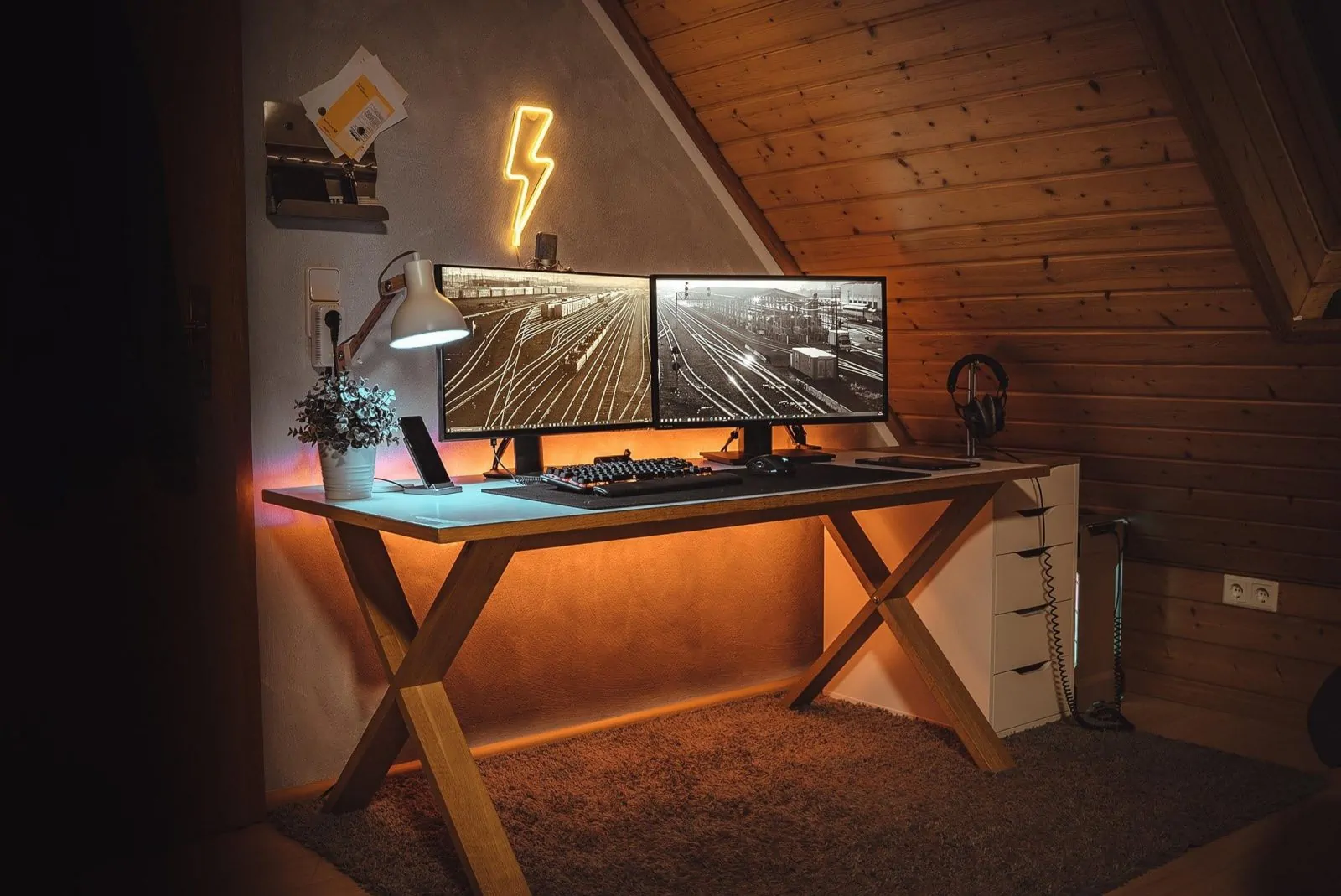 An under-desk led strip creates a warm inviting glow