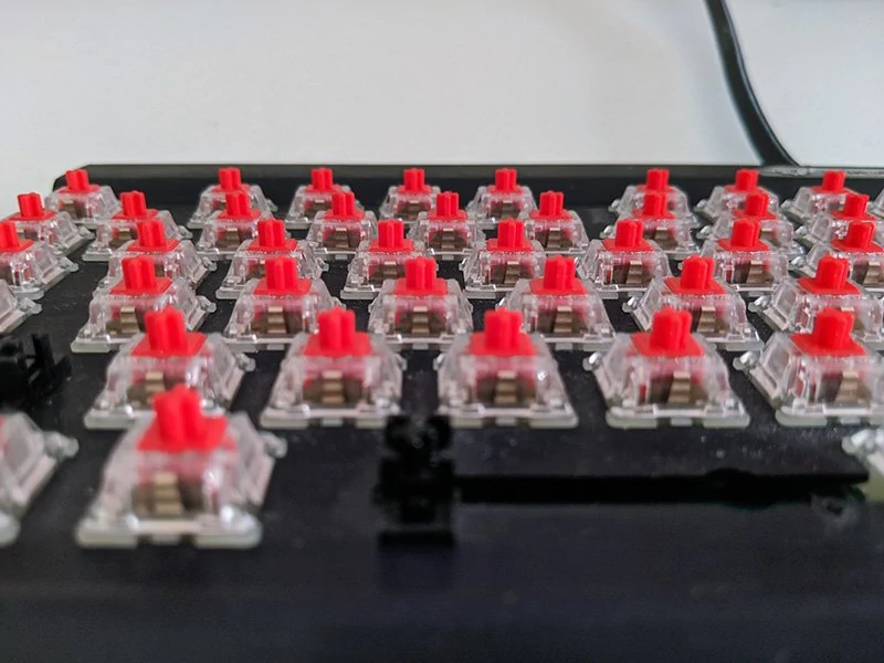 All keycaps removed, exposing Cherry MX switches