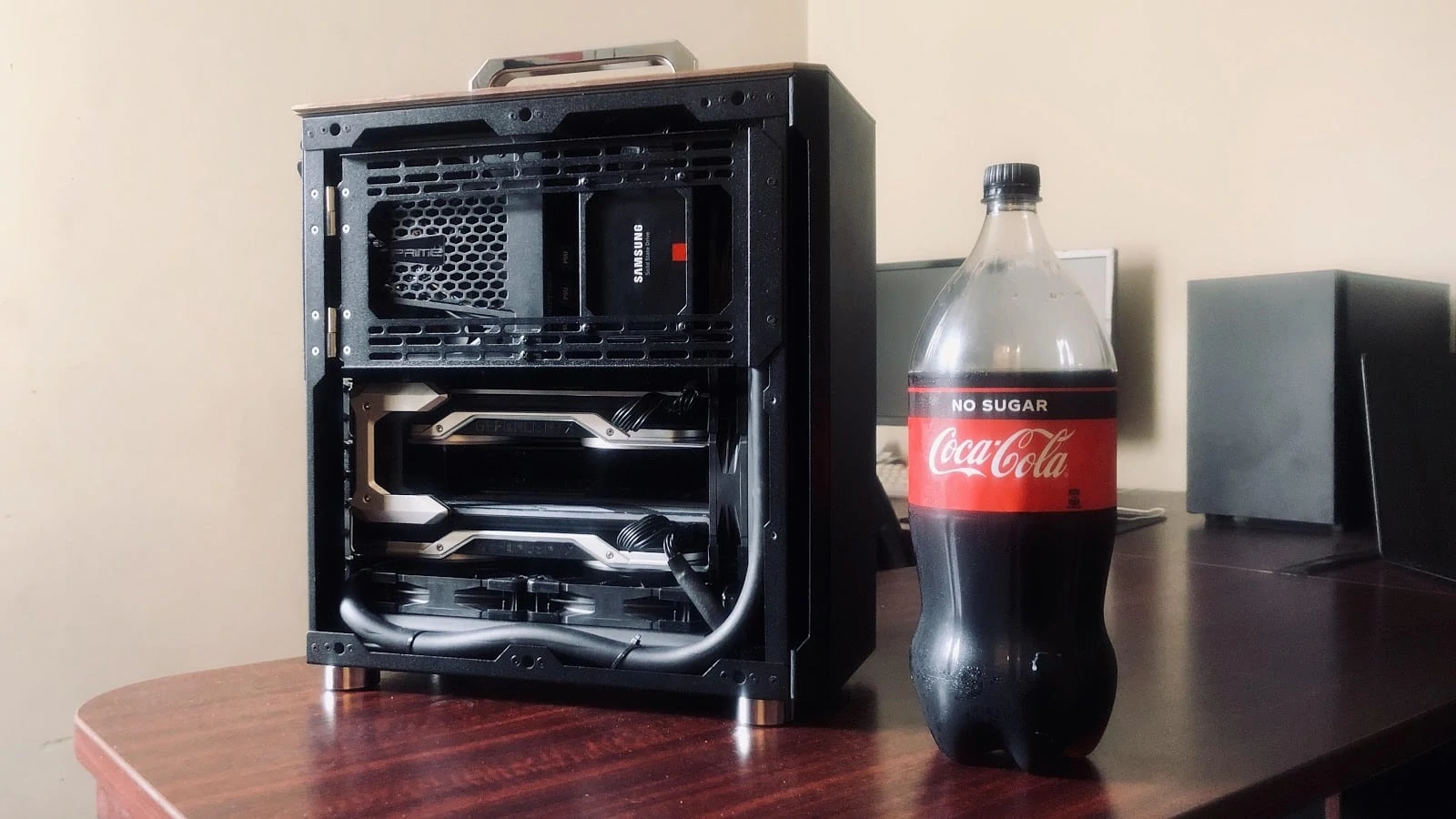 Portable PC case compared to 2L Coke Bottle