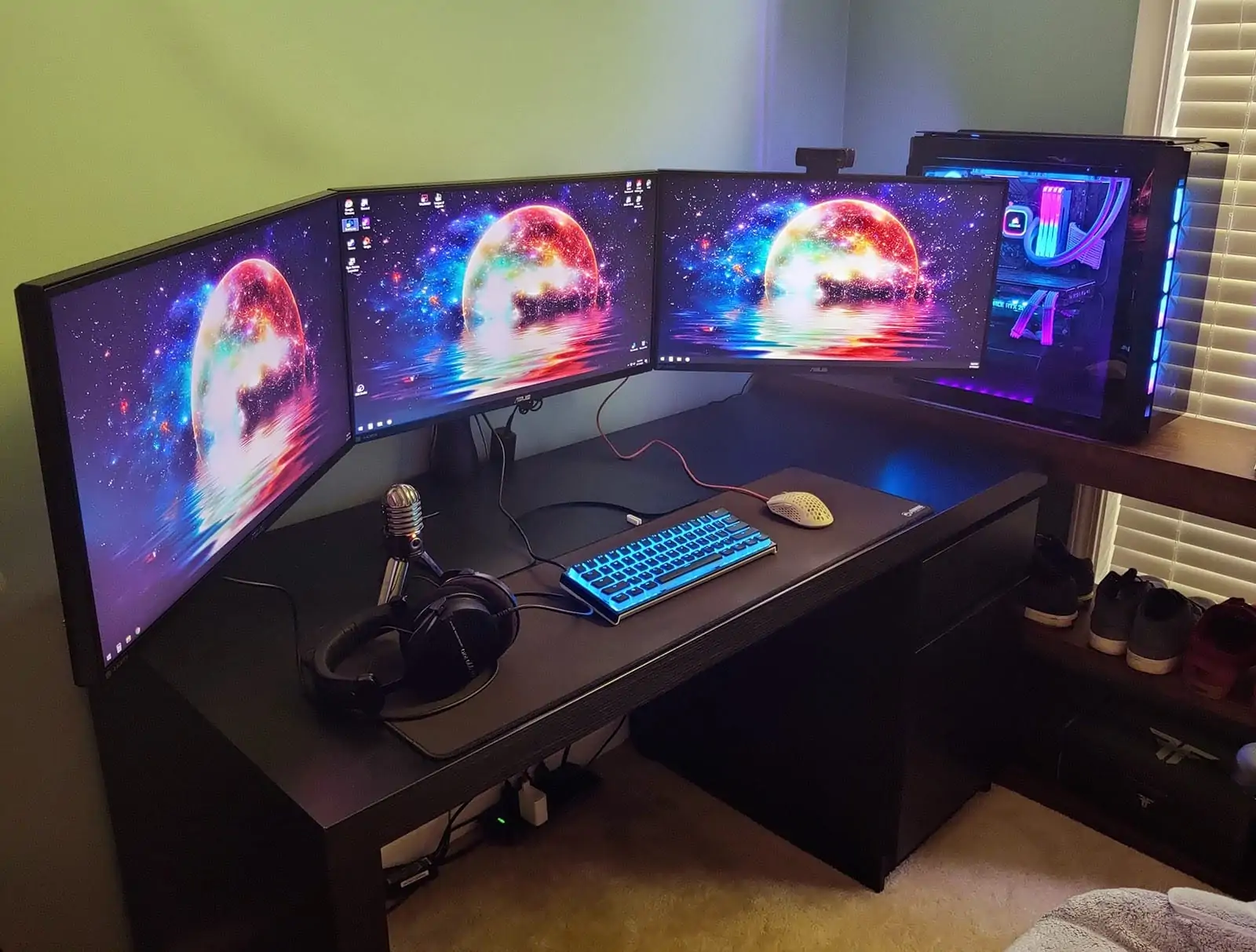 ergotech triple monitor stand in action