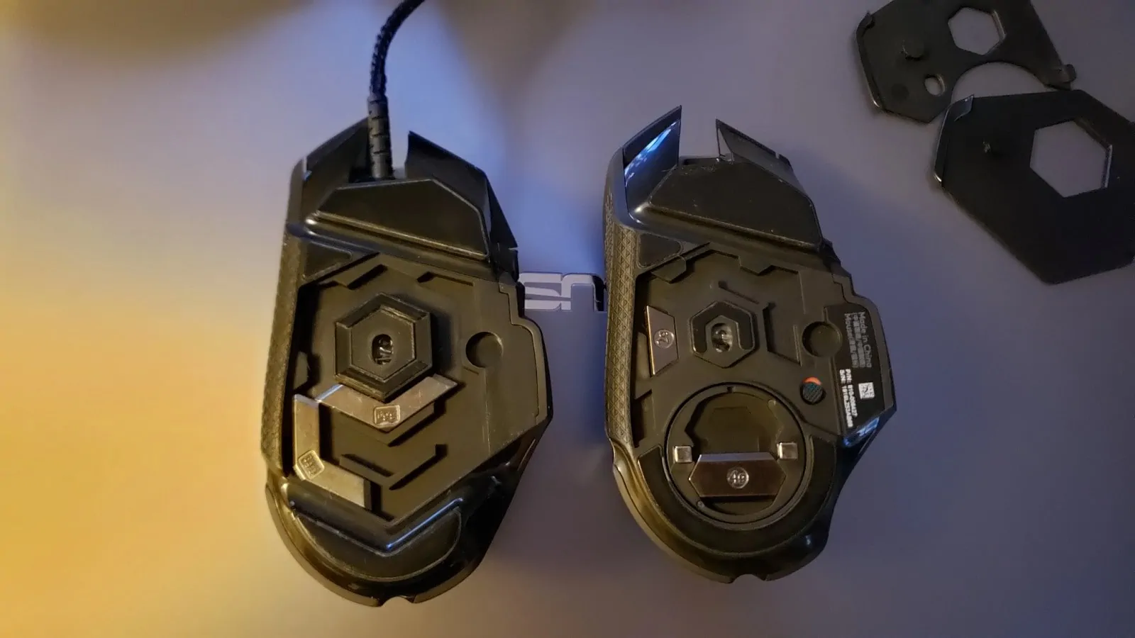 Underside of the G502 showing its adjustable weight system