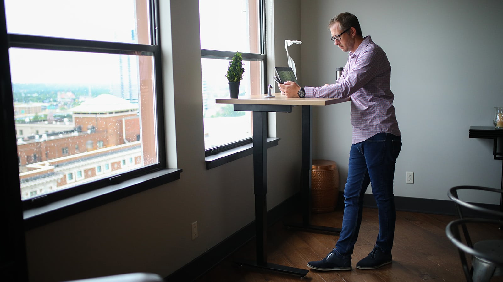 Man adjusting to a standing desk