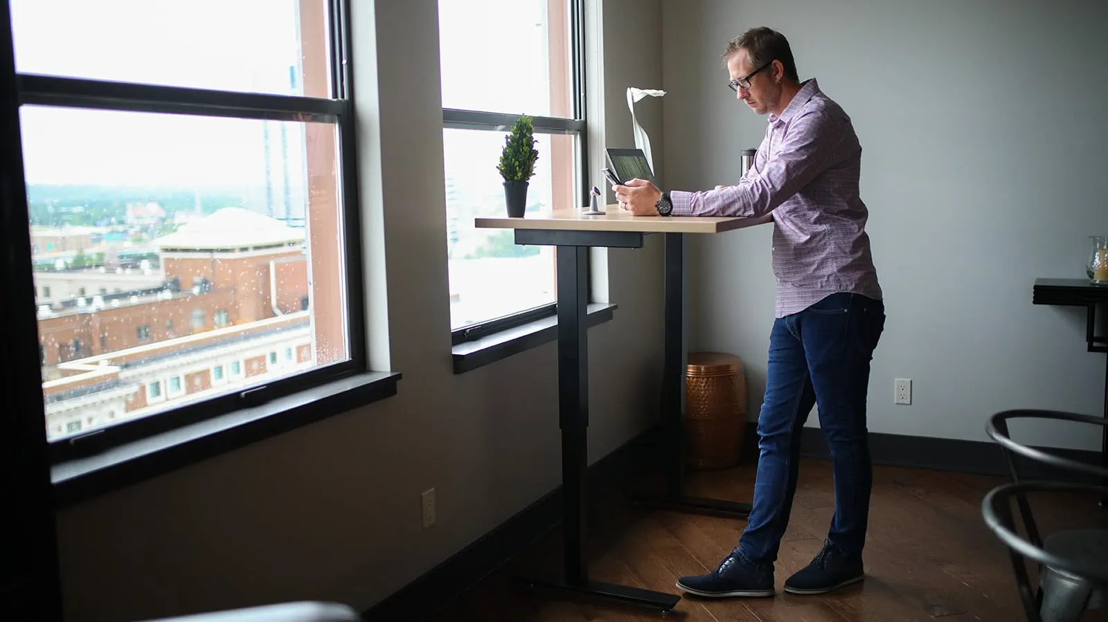 Man adjusting to a standing desk